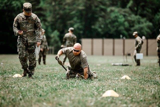 Military personnel training on a field